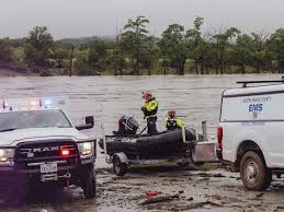 At least 13 dead in Texas floods and more than 20 children missing from a girls summer camp